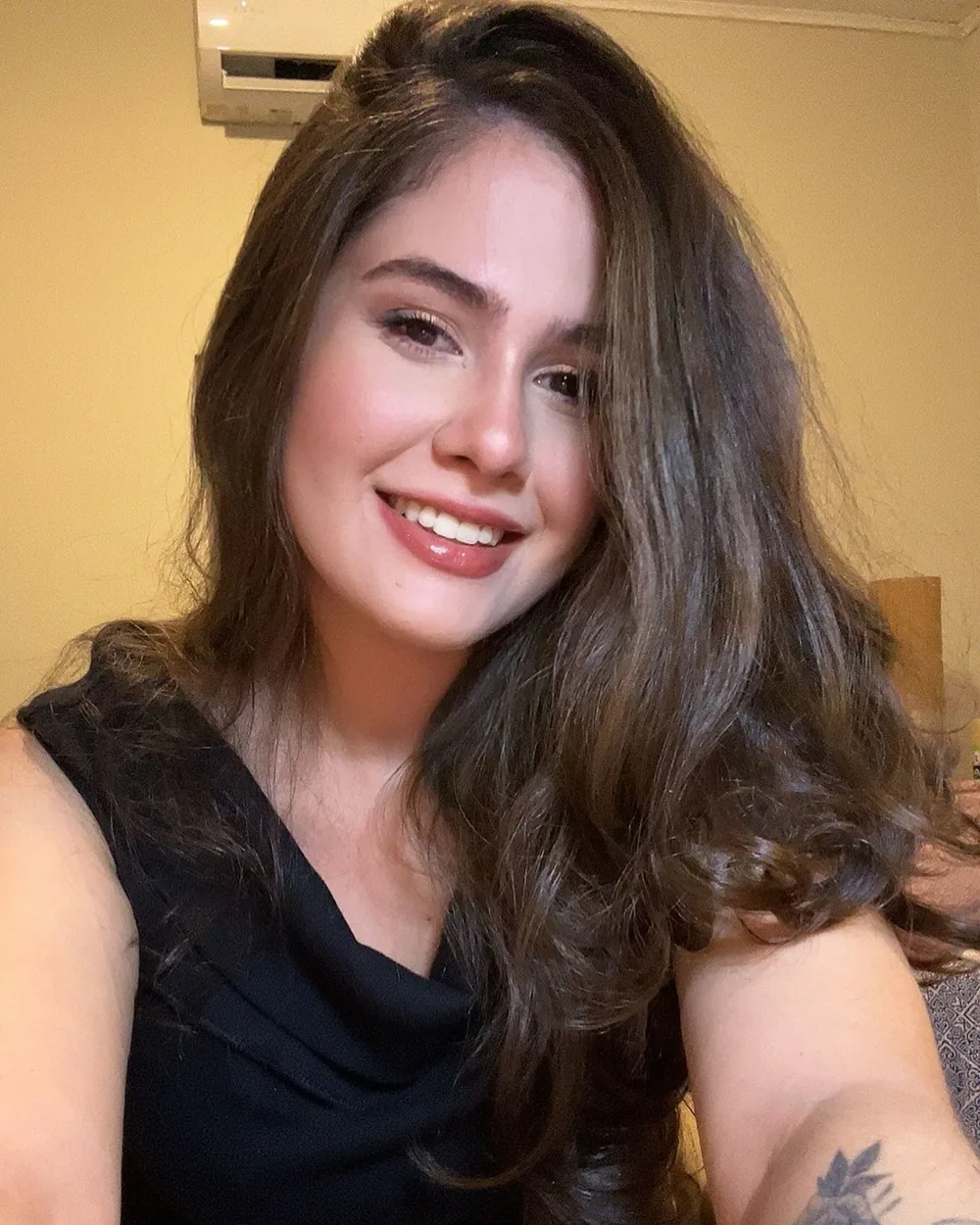 Retrato da Júlia sorrindo